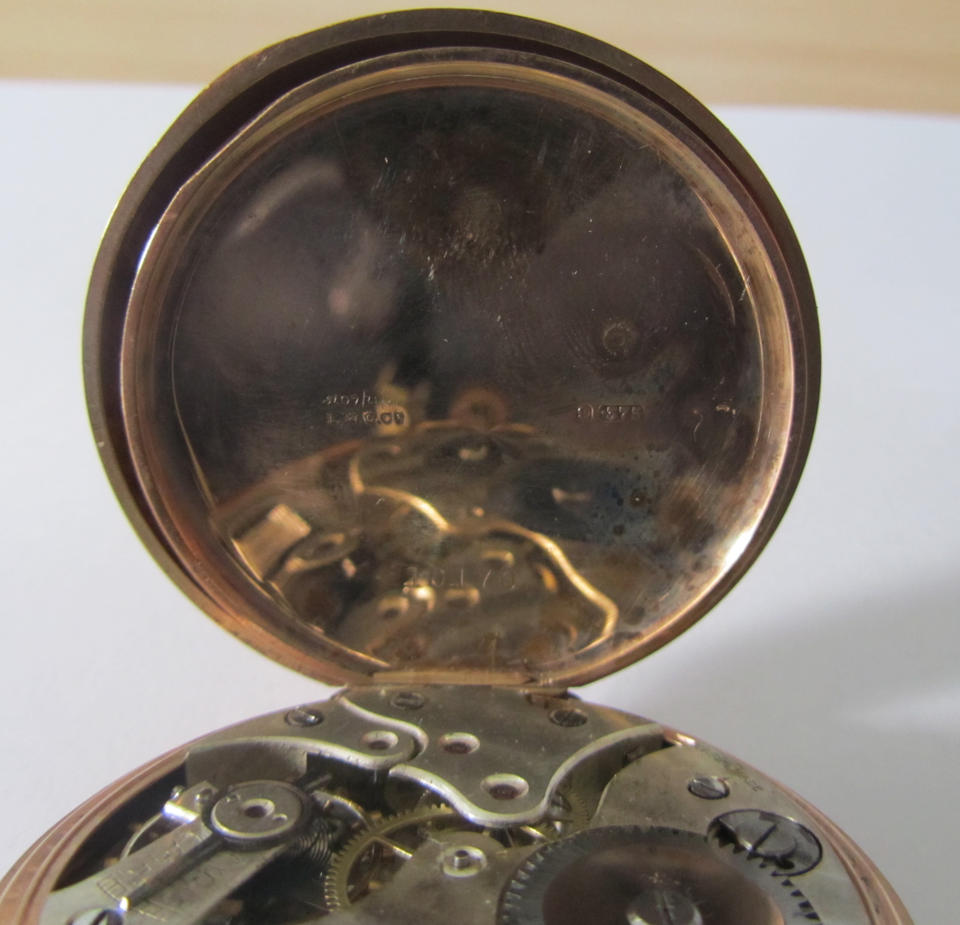 A 9ct rose gold open faced pocket watch; Albert watch chain - Image 7 of 7