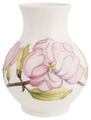 A Moorcroft "Magnolia" baluster vase, 20th century