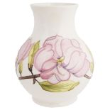 A Moorcroft "Magnolia" baluster vase, 20th century