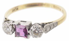 A three stone ruby and diamond set ring