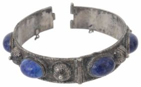 A Persian white metal hinged bracelet