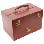 An Asprey red leather travelling vanity box and outer cover