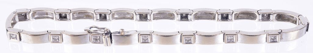 A delicate white gold and diamond set bracelet