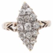 An attractive Victorian style diamond set marquis shaped cluster ring