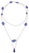 An Edwardian Arts & Crafts lapis lazuli long chain necklace