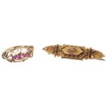 A Victorian Etruscan style thread work brooch and a ruby set ring