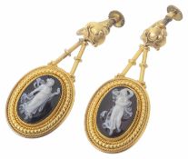 A pair of Victorian Etruscan style carved hard stone cameo earrings