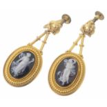 A pair of Victorian Etruscan style carved hard stone cameo earrings