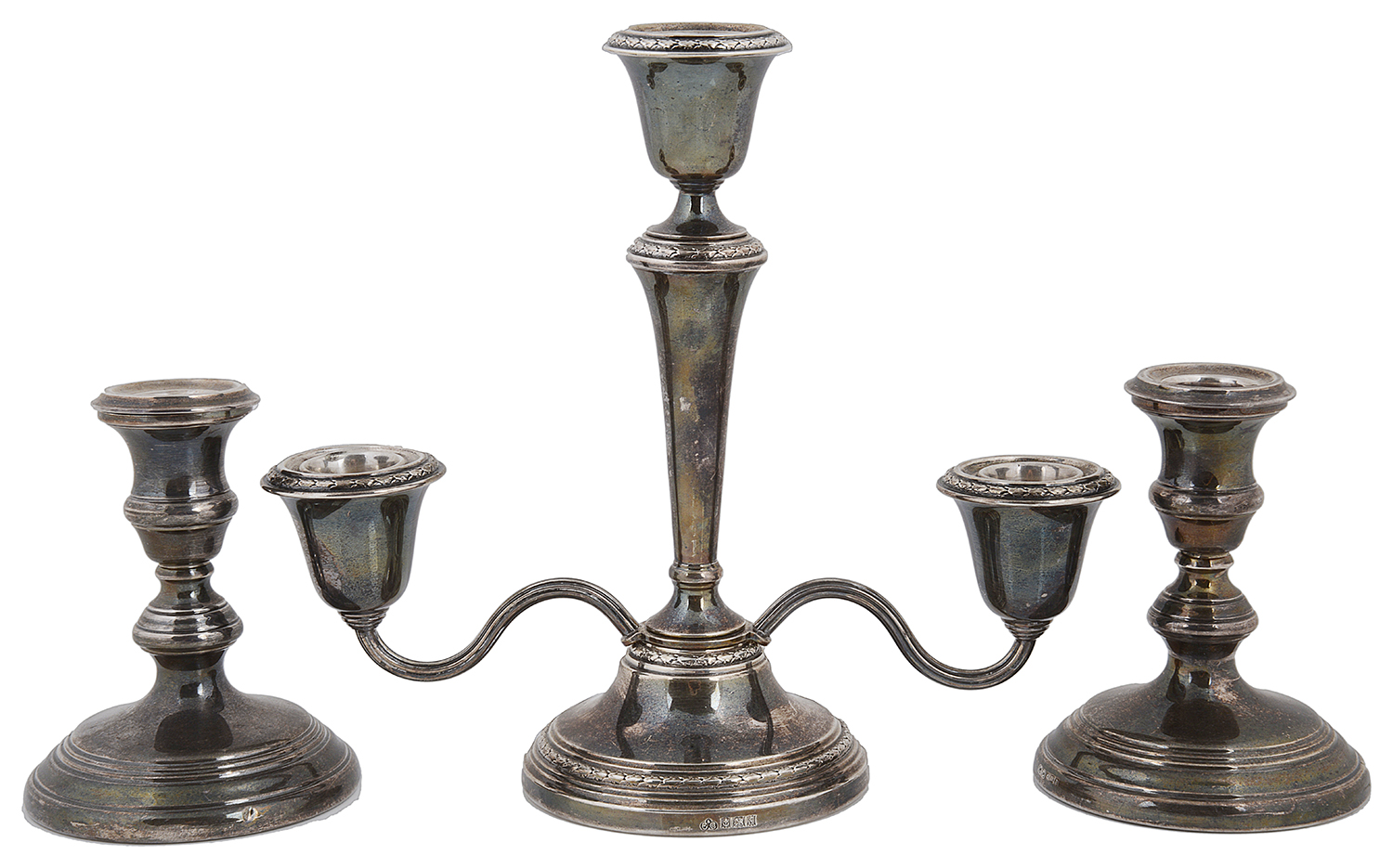 Pair of silver candlesticks; silver three two branch candelabra