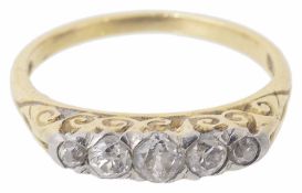 A five stone graduated diamond set ring