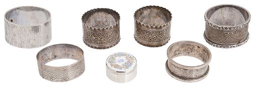 George V and later silver napkin rings and a silver trinket box