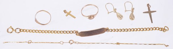 A delicate gold Identity bracelet and several other gold items