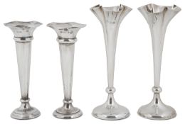 Two pairs of Edwardian silver bud vases, Sheffield 1905 & London 1909