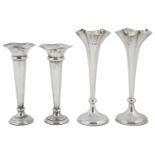 Two pairs of Edwardian silver bud vases, Sheffield 1905 & London 1909