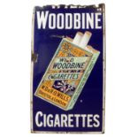 A vintage 'Wild Woodbines' enamelled advertising sign