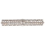 An attractive Edwardian diamond set narrow panel brooch