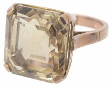 A large square citrine dress ring