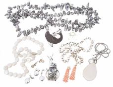 A collection of freshwater pearl and modernist jewellery