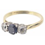 A three stone sapphire and diamond set ring