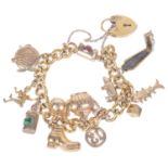 A gilt curb link bracelet with heart padlock fastening