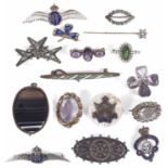 A small collection of costume brooches