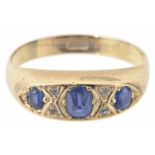 A Victorian three stone sapphire and diamond set gypsy ring