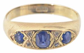 A Victorian three stone sapphire and diamond set gypsy ring