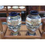 TWO SIMILAR JAPANESE VASE ON WOODEN STANDS