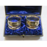 CASED PAIR OF HALLMARKED SILVER NAPKIN RINGS