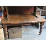 VICTORIAN MAHOGANY WIND OUT DINING TABLE WITH TWO SMALL LEAVES