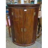 INLAID ANTIQUE MAHOGANY BOW FRONTED CORNER CUPBOARD