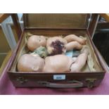 SMALL CASE CONTAINING THREE DOLLS,