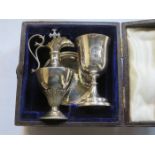 CASED SILVER COLOURED THREE PIECE COMMUNION SET