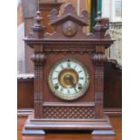 OAK CASED MANTLE CLOCK WITH ENAMELLED AND GILDED DIAL
