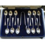 CASED SET OF TWELVE HALLMARKED SILVER SPOONS WITH MATCHING SUGAR TONGS