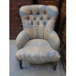 UPHOLSTERED LOW ARMCHAIR