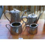 SILVER PLATED THREE PIECE TEA SET AND SIMILAR PLATED COFFEE POT