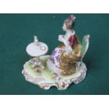 CONTINENTAL HANDPAINTED, GILDED FIGURINE OF A SEATED LADY,