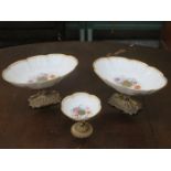 PAIR OF FLORAL DECORATED AND GILDED CONTINENTAL STYLE WAVE EDGED POSY BOWLS ON RAISED STEMMED