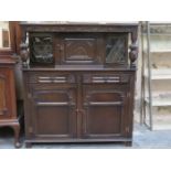 CARVED FRONTED PRIORY STYLE OAK LEADED GLASS COURT CUPBOARD