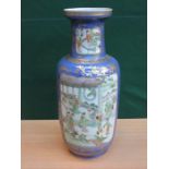 HEAVILY GILDED AND HANDPAINTED CERAMIC VASE, DECORATED WITH ORIENTAL FIGURES WITHIN A TEMPLE SCENE,