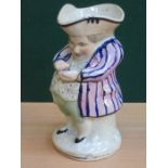 EARLY HANDPAINTED CERAMIC TOBY JUG DEPICTING A CORPULENT GOOD FELLOW,