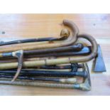 PARCEL OF VARIOUS WALKING STICKS AND TWO PARASOLS