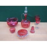 SEVEN PIECES OF CRANBERRY COLOURED GLASS INCLUDING DECANTER