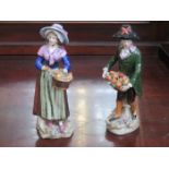 PAIR OF SITZENDORF HANDPAINTED AND GILDED FIGURES DEPICTING A LADY AND GENT WITH BASKETS OF FRUIT,