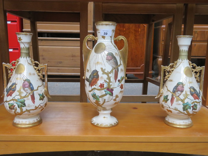 PAIR OF HANDPAINTED AND GILDED TWO HANDLED VASES PLUS ANOTHER SIMILAR VASE,