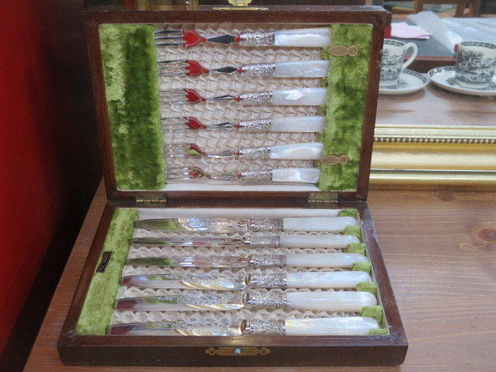 CASES SET OF SIX DECORATED MOTHER OF PEARL HANDLED KNIVES AND FORKS