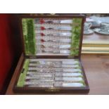 CASES SET OF SIX DECORATED MOTHER OF PEARL HANDLED KNIVES AND FORKS