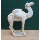 TANG DYNASTY CHINESE TERRACOTTA MODEL OF A BACTRIAN CAMEL, WITH MASK FORM SADDLEBAGS,