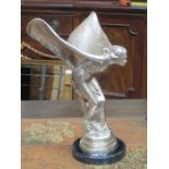 LARGE SILVER COLOURED ROLLS ROYCE SPIRIT OF ECSTASY FIGURE MOUNTED ON CIRCULAR MARBLE STAND,